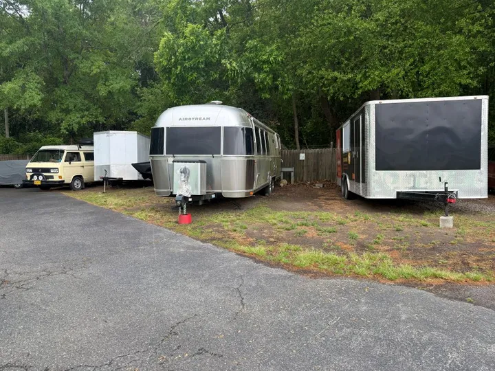 Outdoor vehicle storage in Ashland, VA, featuring trailer and RV parking