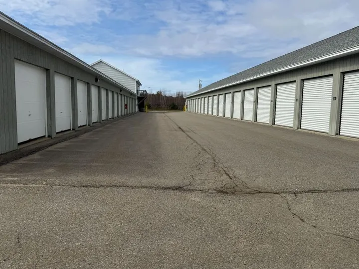 Wide drive aisles with drive-up storage units on either side
