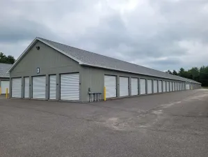 Drive-up storage units with ground-level access