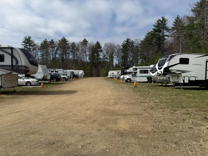Outdoor vehicle storage in Berwick, ME, featuring cars and RVs