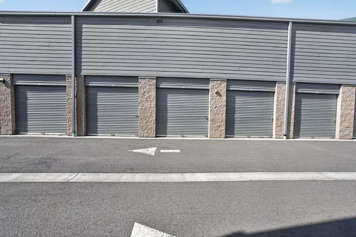 Drive-up storage units in Park City at N Promontory Ranch Rd, with gray roll-up doors and wide drive aisles