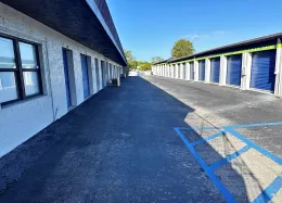 A wide driveway of various drive-up units in Marco Island next to the Storage Star rental office