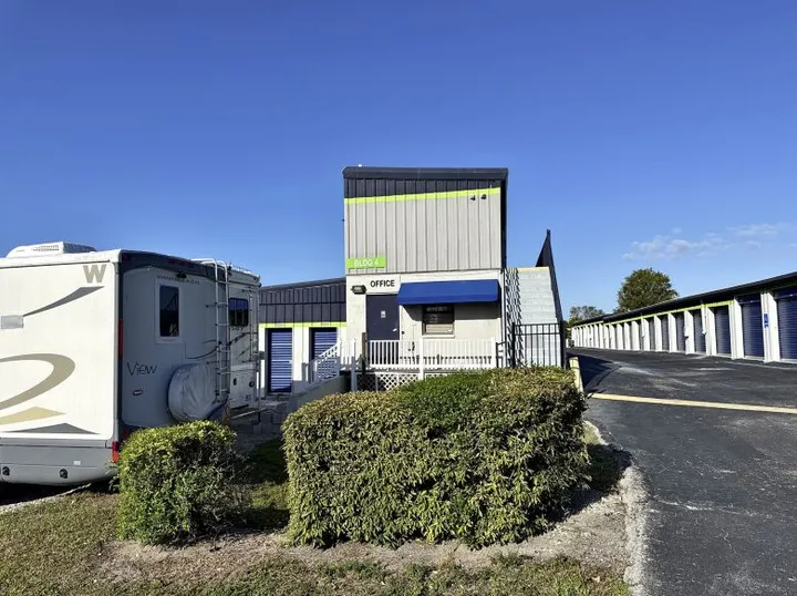 Rental office at Storage Star self-storage in Marco Island, featuring rows of drive-up storage units and RV parking