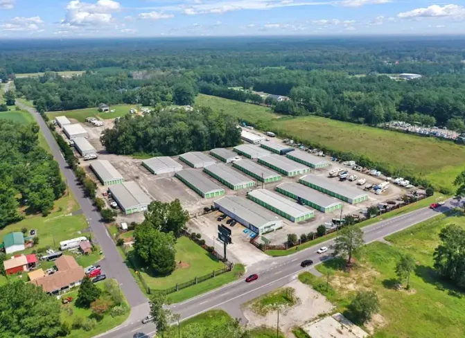 Aerial view of Storage Star Self-Storage in Longs, SC, on Highway 90, featuring outdoor vehicle storage, drive-up storage, and a rental office with indoor storage units