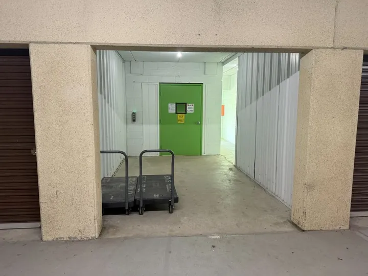 Carts and dollies stationed in front of the lift elevator