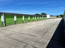 A wide driveway featuring varius drive-up storage units in Rockledge on Huntington Ln