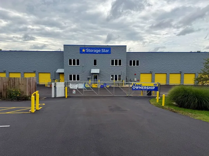 Driveway with gated entry and keypad access leading to Storage Star Self-Storage in West Chicago on Garys Mill Rd