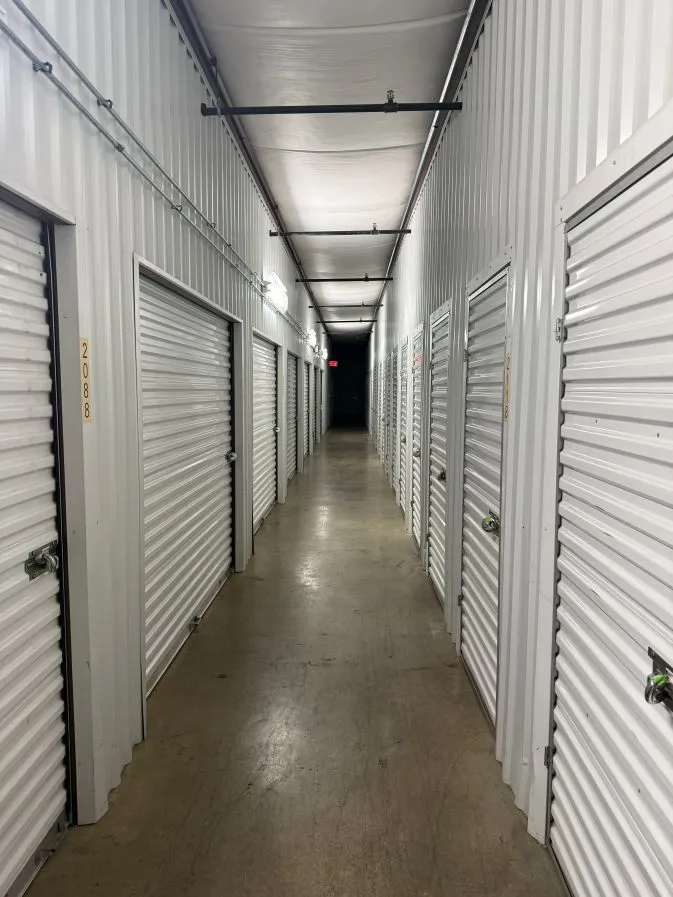 A hallway with various climate-controlled storage units in West Chicago at 28W725 Garys Mill Rd
