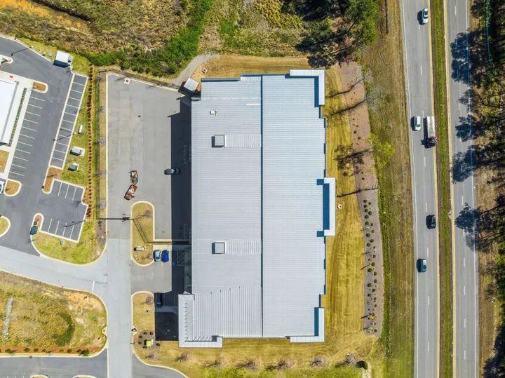 Aerial top-down view of Storage Star Self-Storage in Augusta on Cooper Dr, with a metal roof and paved parking lot
