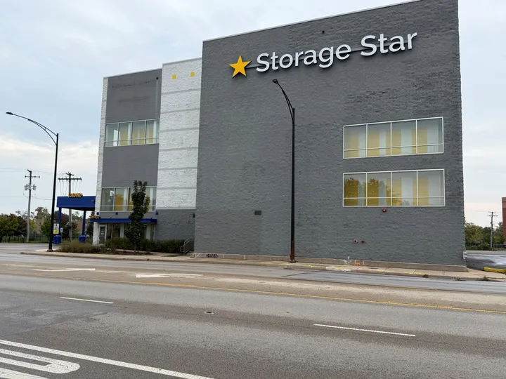 Multistory Storage Star facility on N McCormick Blvd with a grey and white exterior located next to a paved road