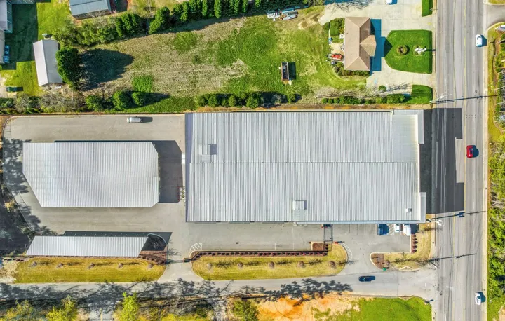 Top-down aerial view of Storage Star Self-Storage in Aiken on Hamilton Dr, featuring metal roofs and paved driving lanes