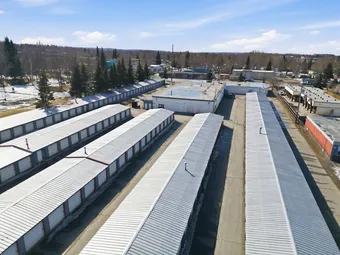 Aerial view of self-storage facility with rows of buildings