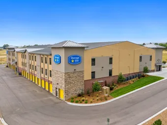 Side exterior view of the storage facility with signage.