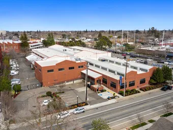 Aerial view of the facility building and surrounding area.