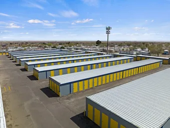 Aerial view of extensive rows of single-story storage units.