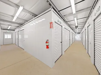 Interior hallway with white storage unit doors