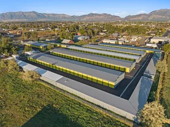 Aerial view of the self-storage facility with mountains in background.