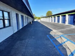 A wide driveway of various drive-up units in Marco Island next to the Storage Star rental office