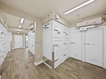 Indoor hallway with climate-controlled storage lockers.