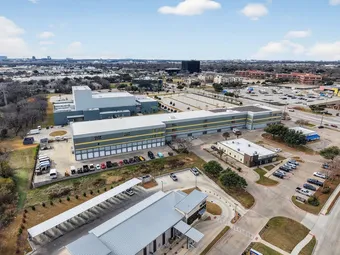 Aerial view of storage facility and surrounding area.