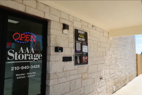 Front office entrance with contact hours and information