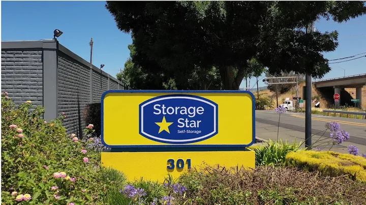 Storage Star Self-Storage sign with address '301'.