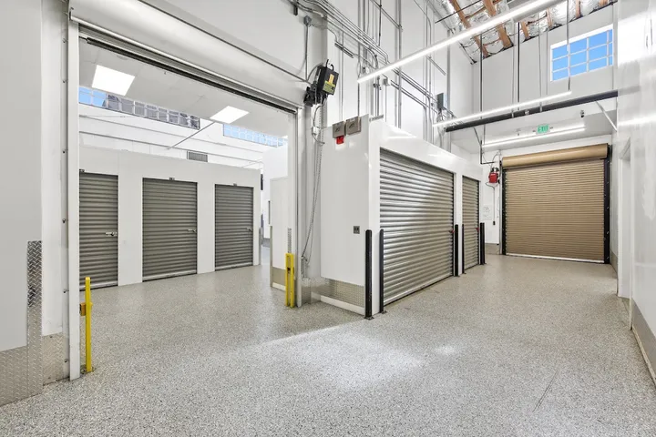 Multi-level loading area with various storage unit doors.