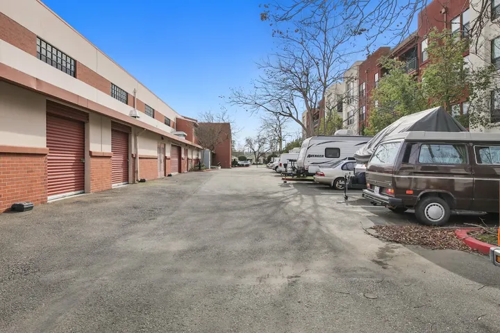 Outdoor drive-up units and parking spaces for vehicles and RVs.
