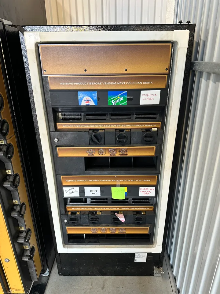 Vending machine offering drinks and snacks.