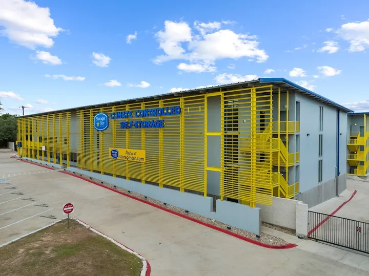Exterior of the storage facility with prominent Climate Controlled sign.