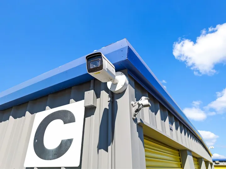 Security camera mounted on a building