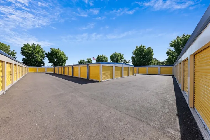 Rows of yellow storage unit doors visible from above.