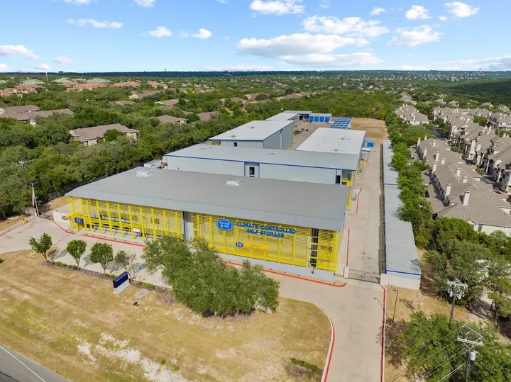 Aerial view of self-storage facility surrounded by residential area.