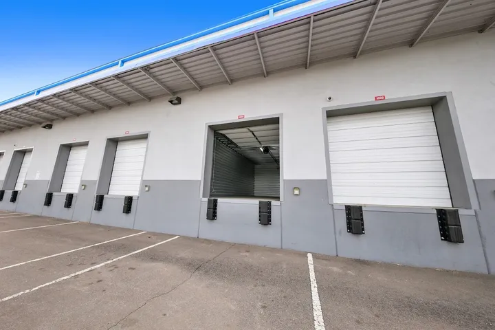 Loading dock with multiple roll-up doors for easy access