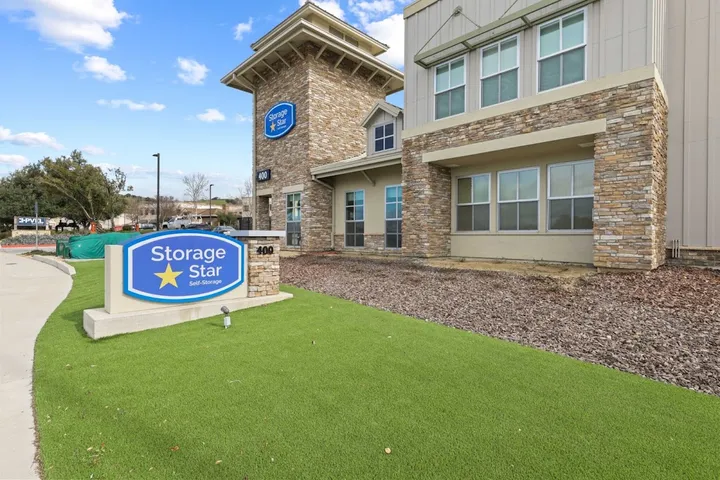 Exterior view of the entrance sign and main office building.