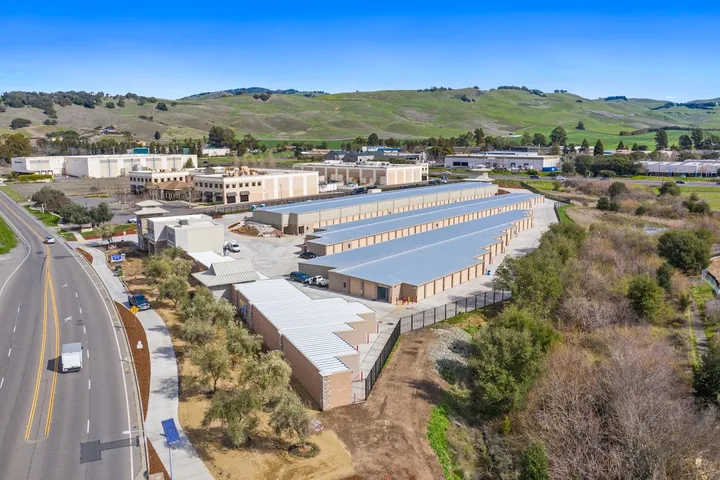 Aerial view of the self-storage facility with surrounding landscape.