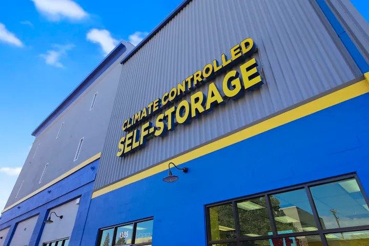 Building exterior with 'Climate Controlled Self Storage' sign.