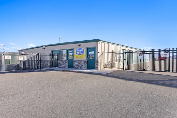Office entrance with secure gate and signage