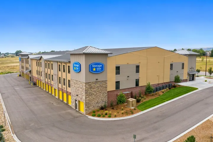 Side exterior view of the storage facility with signage.