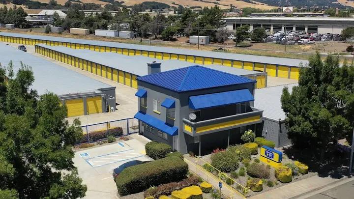 Aerial view of the facility showing office and multiple rows of drive-up units.