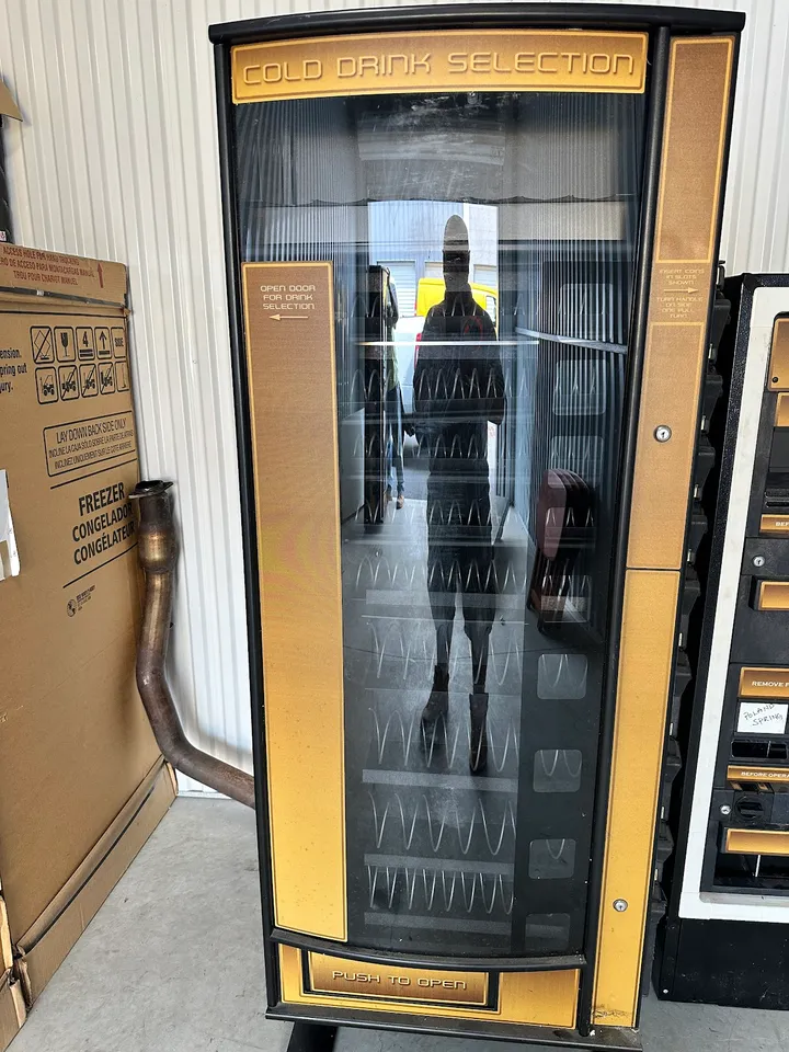 Empty cold drink selection vending machine.