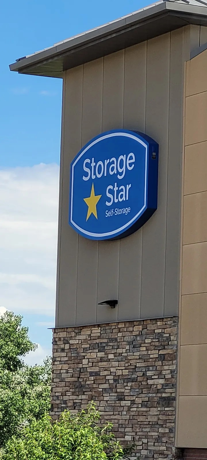 Close-up of a 'Storage Star' building sign.