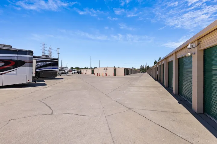 Outdoor storage units and RV parking area.