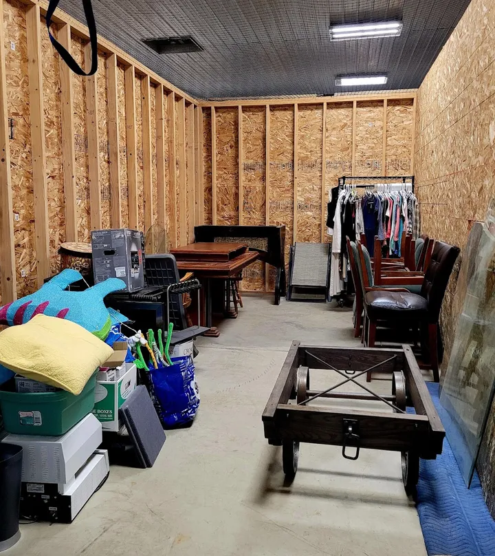 Wood-framed unit interior with stored items