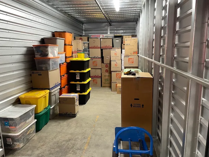 Indoor storage unit filled with packed boxes and containers