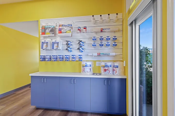 Retail display area with various packing and moving supplies.