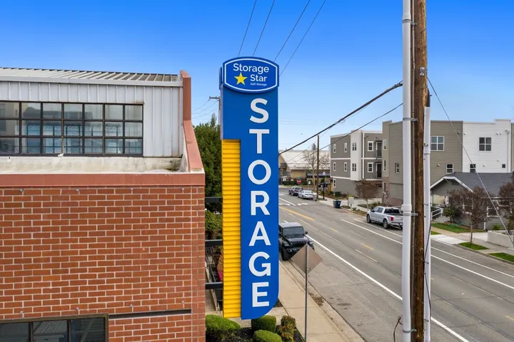 Tall blue and yellow 'Storage Star' pylon sign.