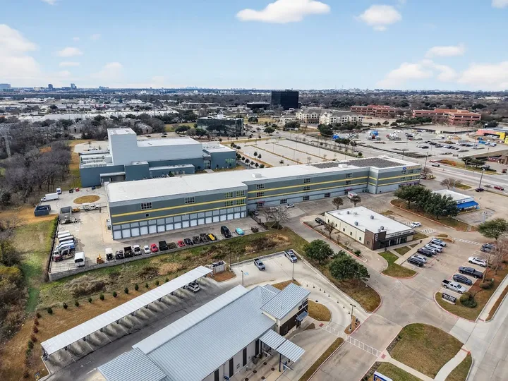 Aerial view of storage facility and surrounding area.